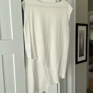 Crème crepe boatneck asymmetrical tunic blouse! Beautiful crepe fabric!!